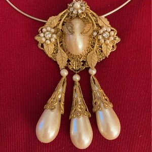 Vintage, Pendant, 3 1/2 “ long and 2 1/2 inches wide. Gold finish. 1980’s